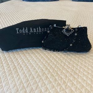 Black beaded Todd Anthony dinner bag with crystal handle worn outside or inside.